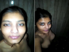 Wet Indian brunette with piercied nose records on her phone sexy bathing