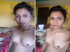 Cute Desi girl with natural tits is wearing her necklace while taking XXX vids