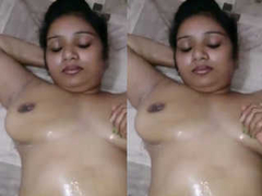 Desi woman with juicy natural boobs is oiled up and massaged by her XXX lover