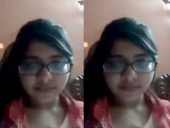 XXX video call with a young slender Desi that has nice tits and wears glasses