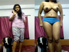 New video with a Desi girl with massive natural boobs putting on XXX strip show