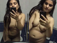 Naked photos in the mirror by a gorgeous Desi brunette with big XXX boobs