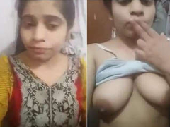 Cute Desi woman with natural boobs and a pretty face is sucking her fingers XXX