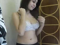 Cute Desi girl with a nice figure is stripping and showcasing her nice XXX