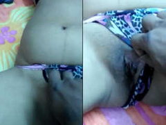 Horny Desi girl with a shaved pussy is removing her panties and gets XXX
