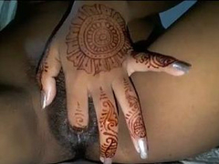 Horny Desi girl fingering her juicy pussy and showing her tattoos in XXX style