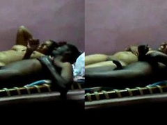 Desi couple relaxes on their bed as they are laying naked after the XXX sex