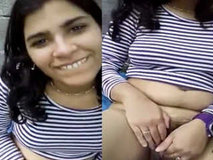 Chubby Desi woman with nice curves is smiling and slowly getting more XXX