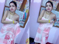 Shy Desi girl with a cute face is wearing a necklace and looks shy for XXX