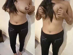 Incredibly attractive Desi girl with natural boobs is playing with her XXX