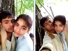 Young passionate Desi couple are outdoors where they are kissing before XXX