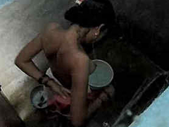 Naked Desi woman with a nice figure is naked in the bathroom and she gets XXX