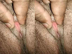 The tight trimmed pussy of a Desi woman is shown in a close up of XXX video